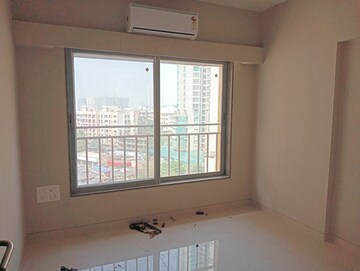 Room in 2 BHK Apartment at Harasiddh Viraaj, Malad East – for Rent