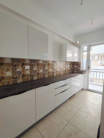 Kitchen in 3 BHK Apartment at Sushma Valencia, International Airport Road – for Rent