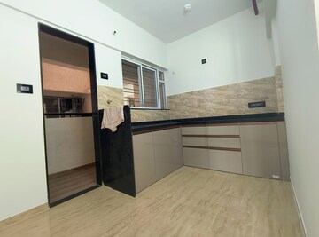 Kitchen in 2 BHK Apartment at VTP Beaumonde, Kharadi – for Rent