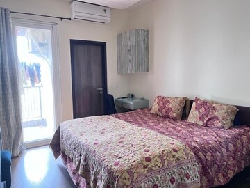 Bedroom in 4 BHK Builder Floor at DLF Garden City Independent Floors, Sector 92 – for Rent