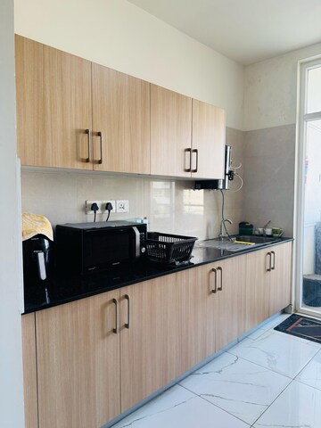 Kitchen in 3 BHK Apartment at Mantri Lithos, Thanisandra – for Rent