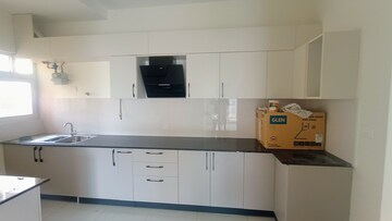 Kitchen in 2 BHK Apartment at Brigade Buena Vista, Budigere – for Rent