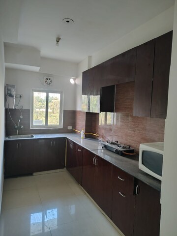 Kitchen in 2 BHK Apartment at Gardenia Gateway, Sector 75 – for Rent