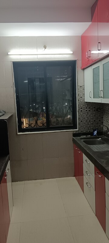 Kitchen in 1 BHK Apartment at Tharwani Rosalie, Kalyan West – for Rent
