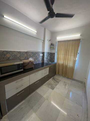 Kitchen in 1 BHK Apartment at Hiranandani Gardens Cypress, Powai – for Rent