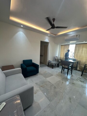 Living Room in 1 BHK Apartment at Hiranandani Gardens Cypress, Powai – for Rent