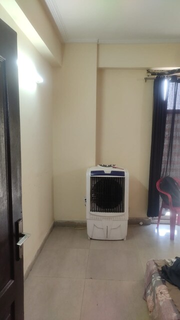 Living Room in 3 BHK Apartment at Amrapali Empire, Sain Vihar – for Sale