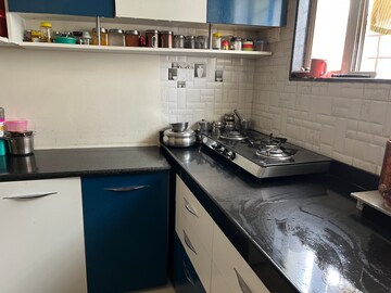 Kitchen in 2 BHK Apartment at Pavilion Regency, Mahalunge – for Sale