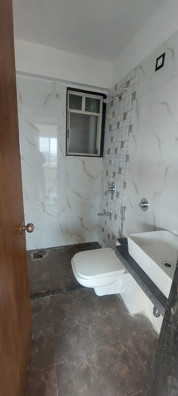 Bathroom in 1 BHK Apartment at Sadashiv Peth – for Rent