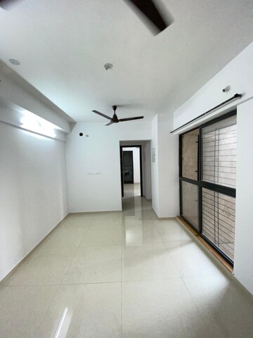 Living Room in 1 BHK Apartment at Lodha Palava Downtown, Dombivli East – for Rent