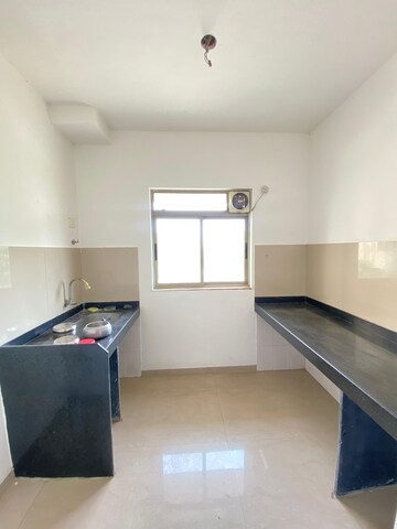 Kitchen in 1 BHK Apartment at Lodha Casa Rio Gold, Dombivli East – for Rent