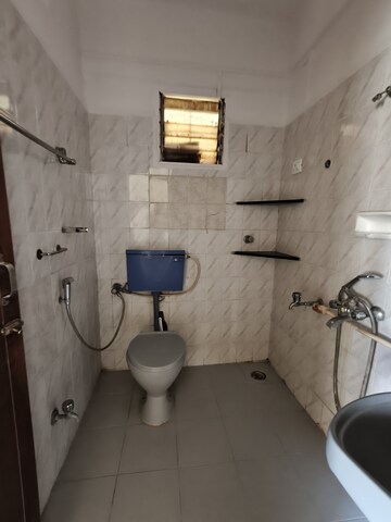 Bathroom in 2 BHK Apartment at Harsiddh Park CHS, Vasant Vihar – for Rent