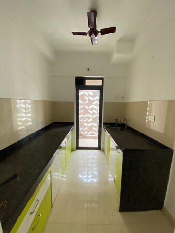Kitchen in 2 BHK Apartment at Lodha Downtown, Dombivli East – for Rent