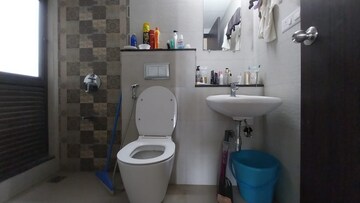 Bathroom in 2 BHK Apartment at Mahindra Roots, Kandivali East – for Rent