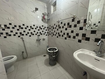 Bathroom in 2 BHK Builder Floor at Freedom Fighters Enclave – for Rent