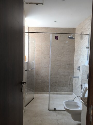 Bathroom in 3 BHK Apartment at Ambience Tiverton, Sector 50 – for Rent