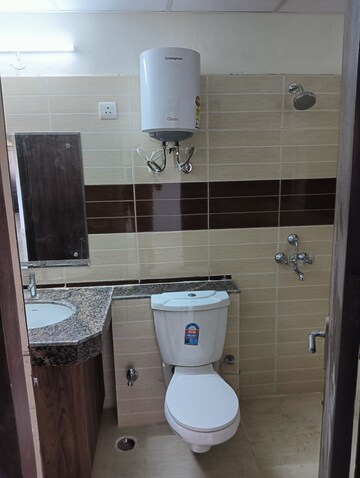 Bathroom in 3 BHK Apartment at AWHO Shanti Vihar, Sector 95 – for Rent
