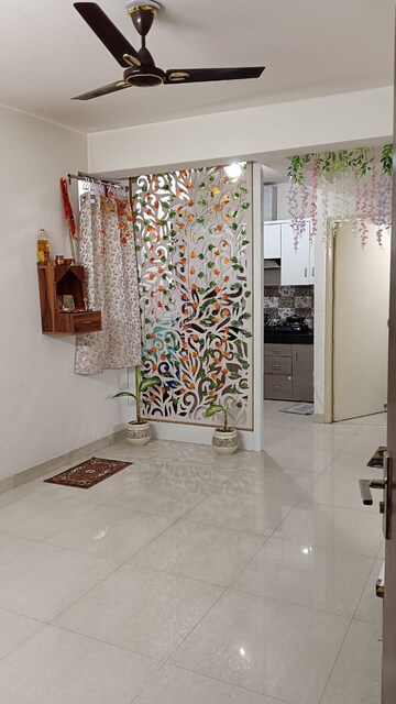 Living Room in 2 BHK Apartment at Signature Global Synera, Sector 81 – for Sale