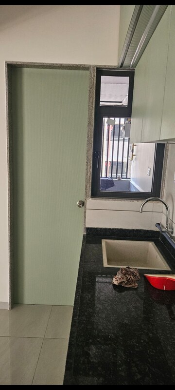 Kitchen in 3 BHK Apartment at Aristo Anandam, Near Nirma University On Sg Highway – for Rent