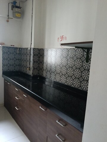 Kitchen in 3 BHK Apartment at Vijay Annex 32, Waghbil – for Rent