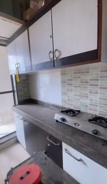 Kitchen in 2 BHK Apartment at Gaurav Woods Phase I, Mira Road – for Sale