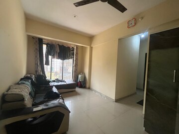 Living Room in 2 BHK Apartment at Krishna Villa CHS, Ulwe Sector 17 – for Rent