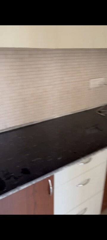 Kitchen in 2 BHK Apartment at La Residentia, Tech Zone 4 Greater Noida – for Rent