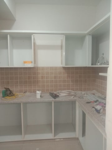 Kitchen in 2 BHK Apartment at Mahagun Mywoods, Sector 16c Greater Noida – for Rent