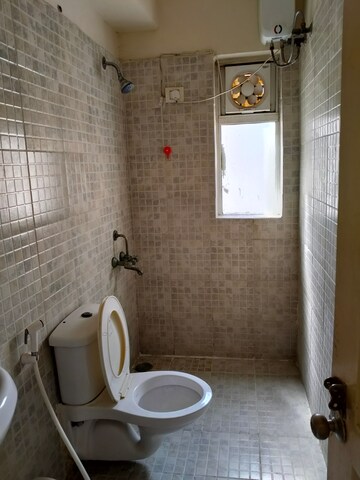 Bathroom in 2 BHK Apartment at Paras Tierea, Sector 137 – for Rent