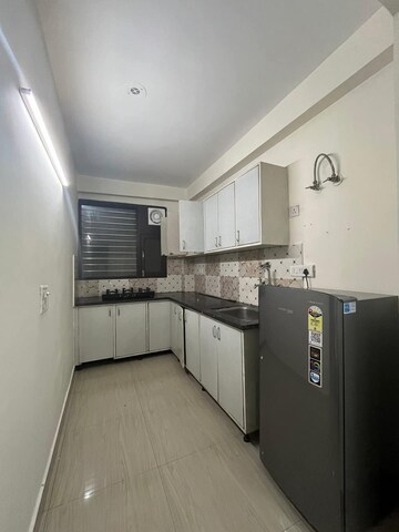 Kitchen in 2 BHK Builder Floor at Ansal Sushant Lok I, Sector 43 – for Rent