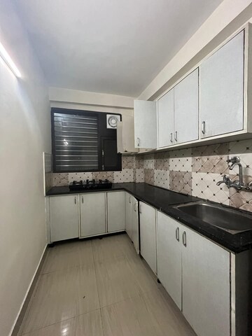 Kitchen in 2 BHK Builder Floor at Ansal Sushant Lok I, Sector 43 – for Rent