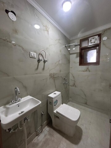 Bathroom in 1 BHK Builder Floor at Freedom Fighters Enclave – for Rent