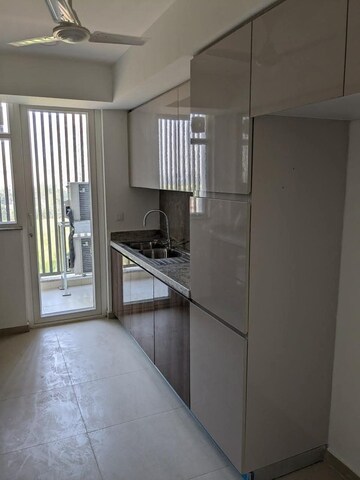 Kitchen in 3 BHK Builder Floor at DLF Gardencity Enclave, Sector 93 – for Sale