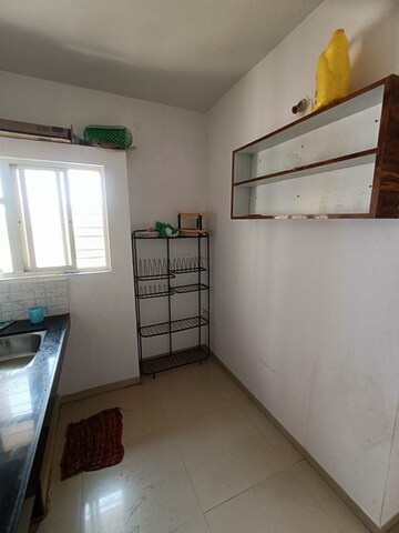 Kitchen in 1 BHK Apartment at Navratna Exotica, Kharadi Bypass Road – for Rent