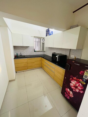Kitchen in 2 BHK Apartment at Omkar Signet, Malad East – for Rent