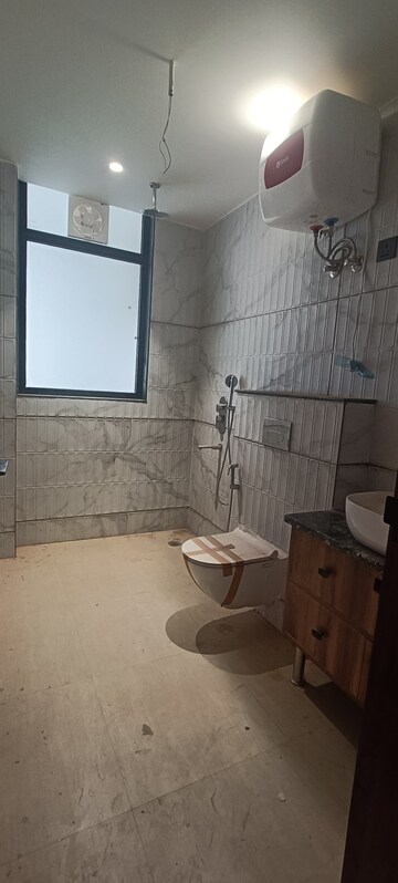 Bathroom in 4 BHK Builder Floor at Ansal Sushant Lok I, Sector 43 – for Rent