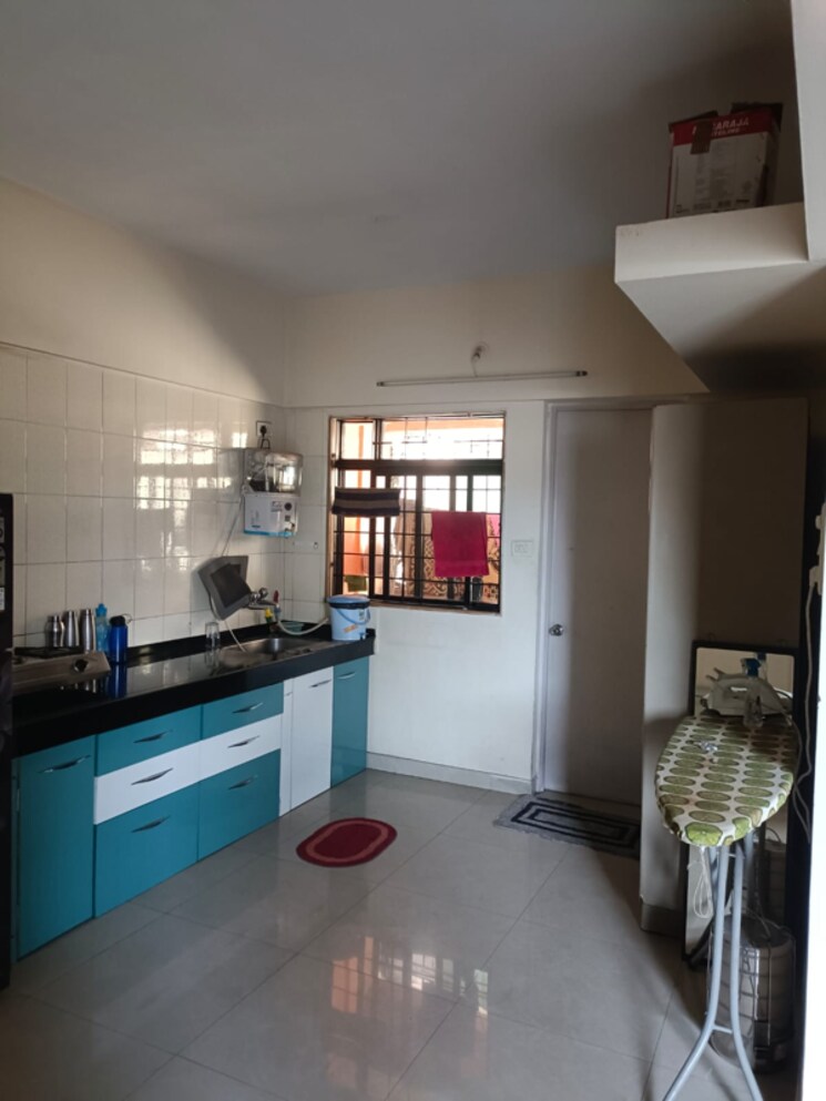 Kitchen, magarpatta-city-cosmos 3 Bedroom 1500 Sq.Ft. Apartment In Kharadi Bypass Road Pune 8367235