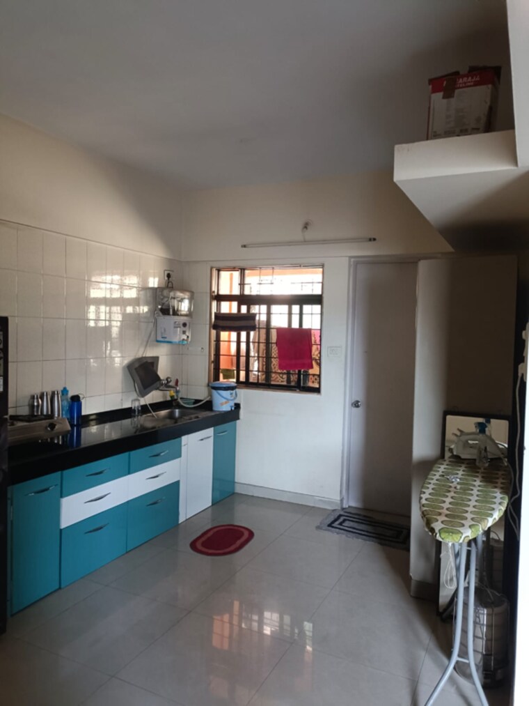 Kitchen, magarpatta-city-cosmos 3 Bedroom 1500 Sq.Ft. Apartment In Kharadi Bypass Road Pune 8367235