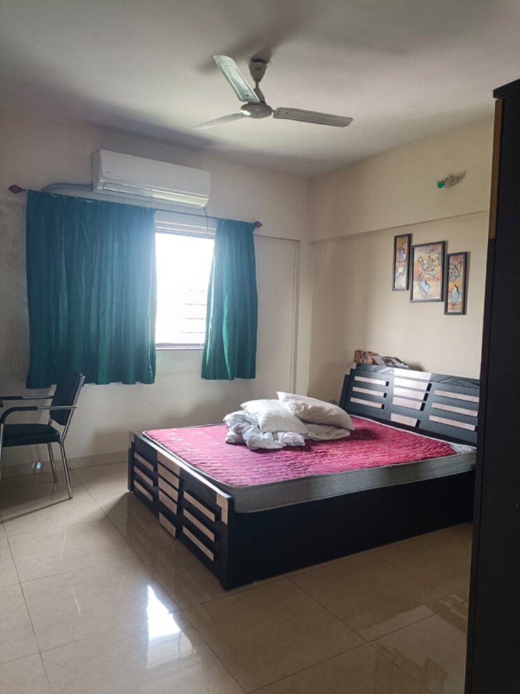 Bedroom, magarpatta-city-cosmos 3 Bedroom 1500 Sq.Ft. Apartment In Kharadi Bypass Road Pune 8367235