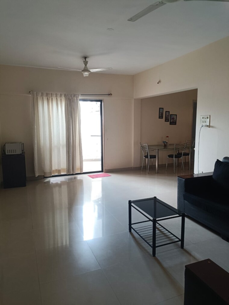 Living Room, magarpatta-city-cosmos 3 Bedroom 1500 Sq.Ft. Apartment In Kharadi Bypass Road Pune 8367235