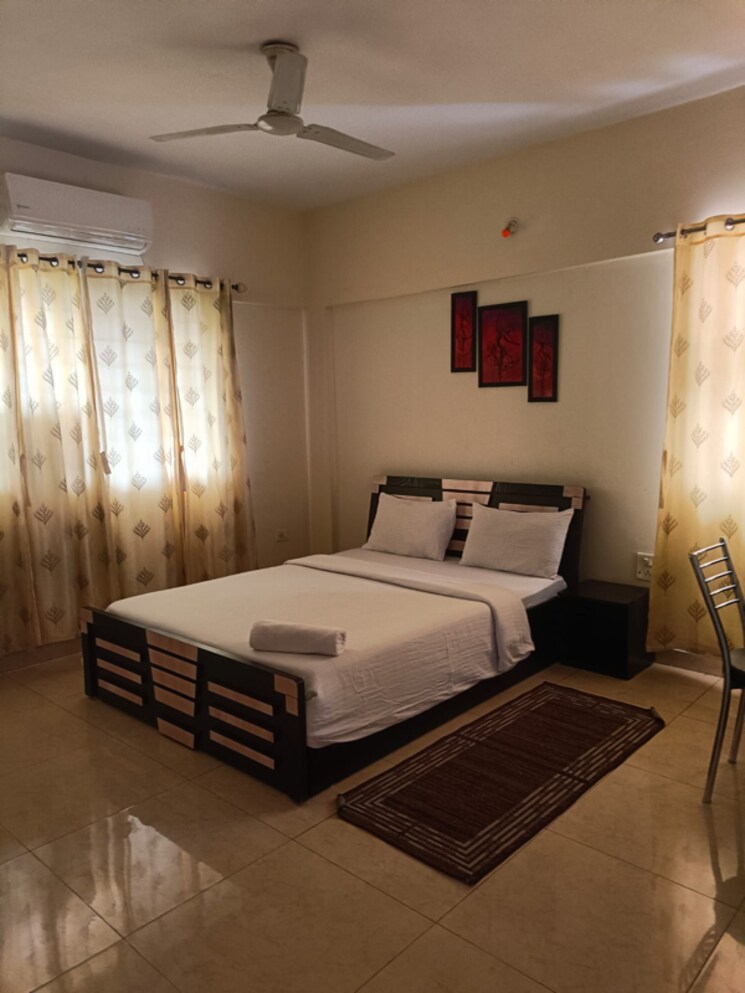 Bedroom, magarpatta-city-cosmos 3 Bedroom 1500 Sq.Ft. Apartment In Kharadi Bypass Road Pune 8367235