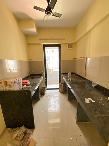 Kitchen in 1 BHK Apartment at Lodha Palava Downtown, Dombivli East – for Sale