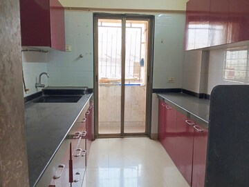 Kitchen in 1.5 BHK Apartment at Madhav Palacia, Ghodbunder Road – for Rent