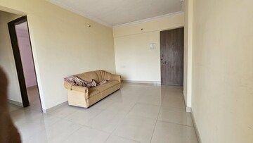Living Room in 1 BHK Apartment at Pushpanjali Heights, Owale – for Rent