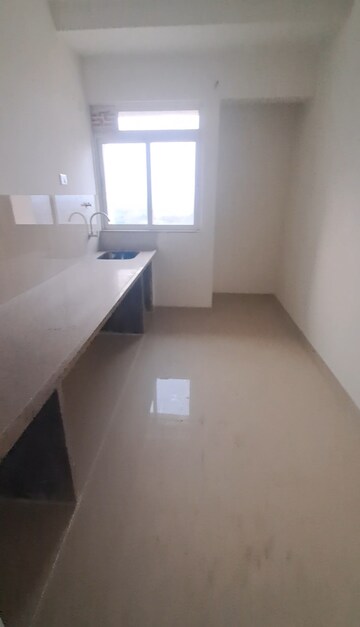 Kitchen in 2 BHK Apartment at Puraniks City Reserva, Ghodbunder Road – for Sale