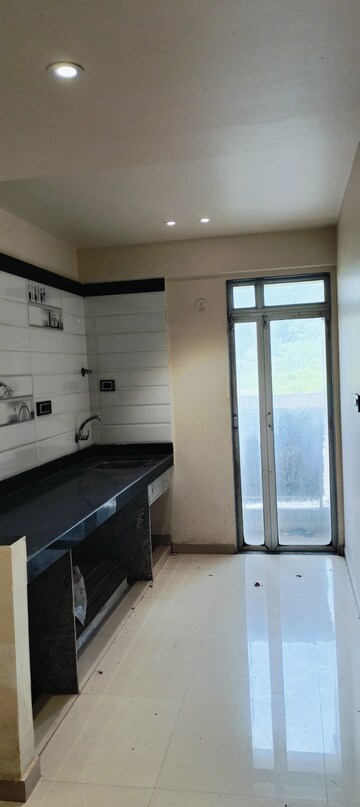Kitchen in 2 BHK Apartment at KIPL Morya, Kasarvadavali – for Sale
