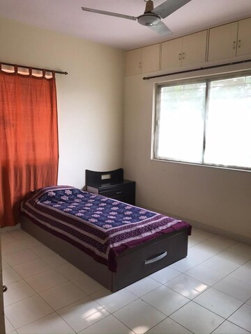 Bedroom in 2 BHK Apartment at Amit Nandanvan, Pimple Nilakh – for Rent