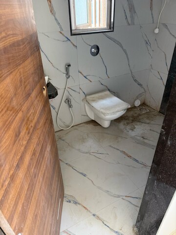 Bathroom in 3 BHK Apartment at Shraddha Imperial, Mahim West – for Rent
