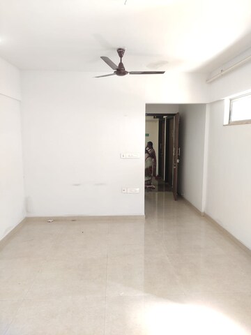 Living Room in 2 BHK Apartment at Lodha Palava Downtown, Dombivli East – for Sale