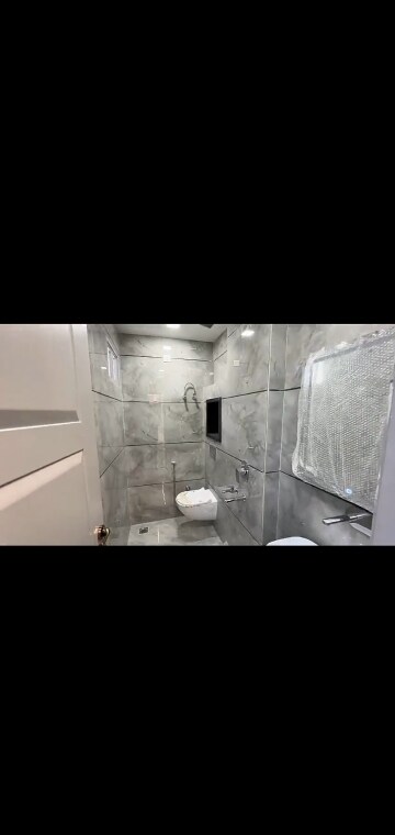 Bathroom in 4 BHK Builder Floor at Dwarka Mor – for Sale